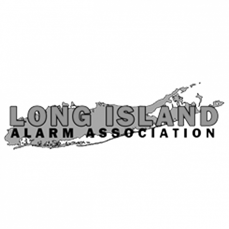 Gray Long Island Alarm Association badge.
