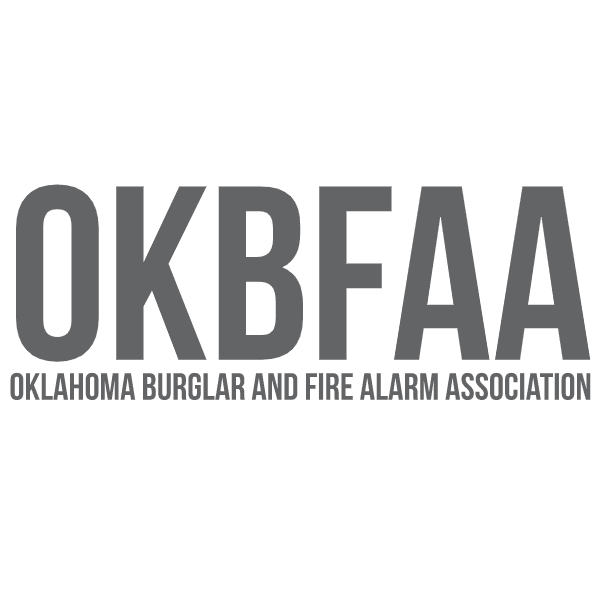 Gray and white OKBFAA badge.