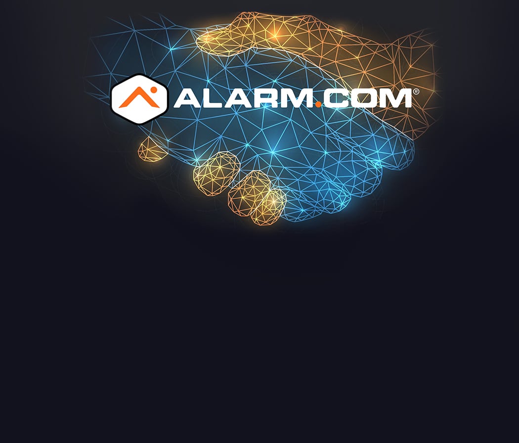 two hands shaking with alarm.com logo above it