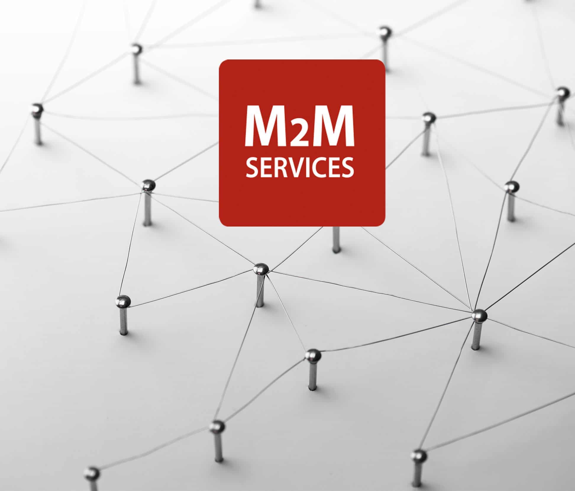 Red M2M Services badge.